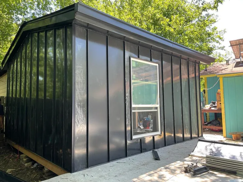 Black standing seam metal wall panels for Roof Inspection in Ladson